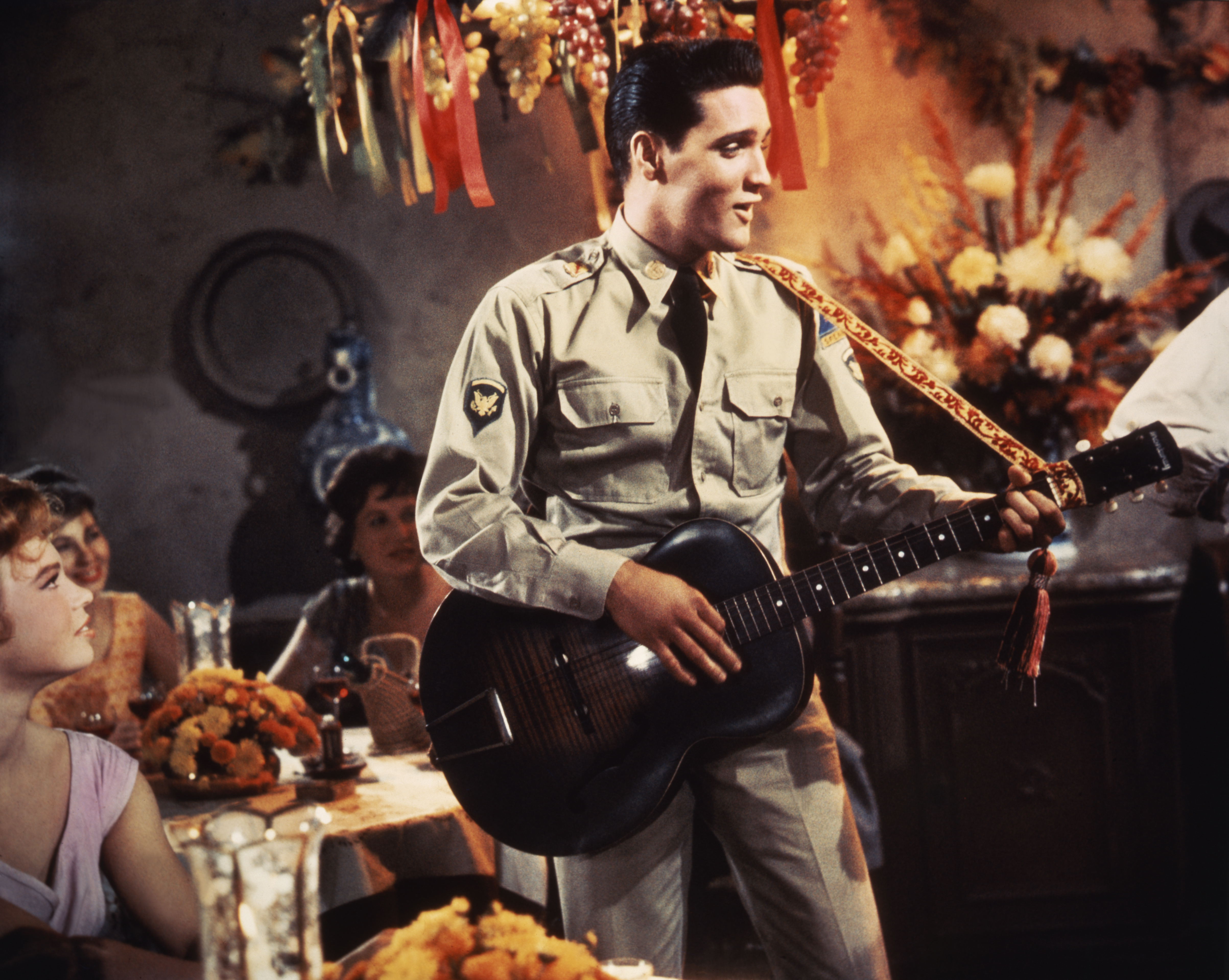 Elvis Presley singing in G.I. Blues (Photo by Sunset Boulevard/Corbis via Getty Images)