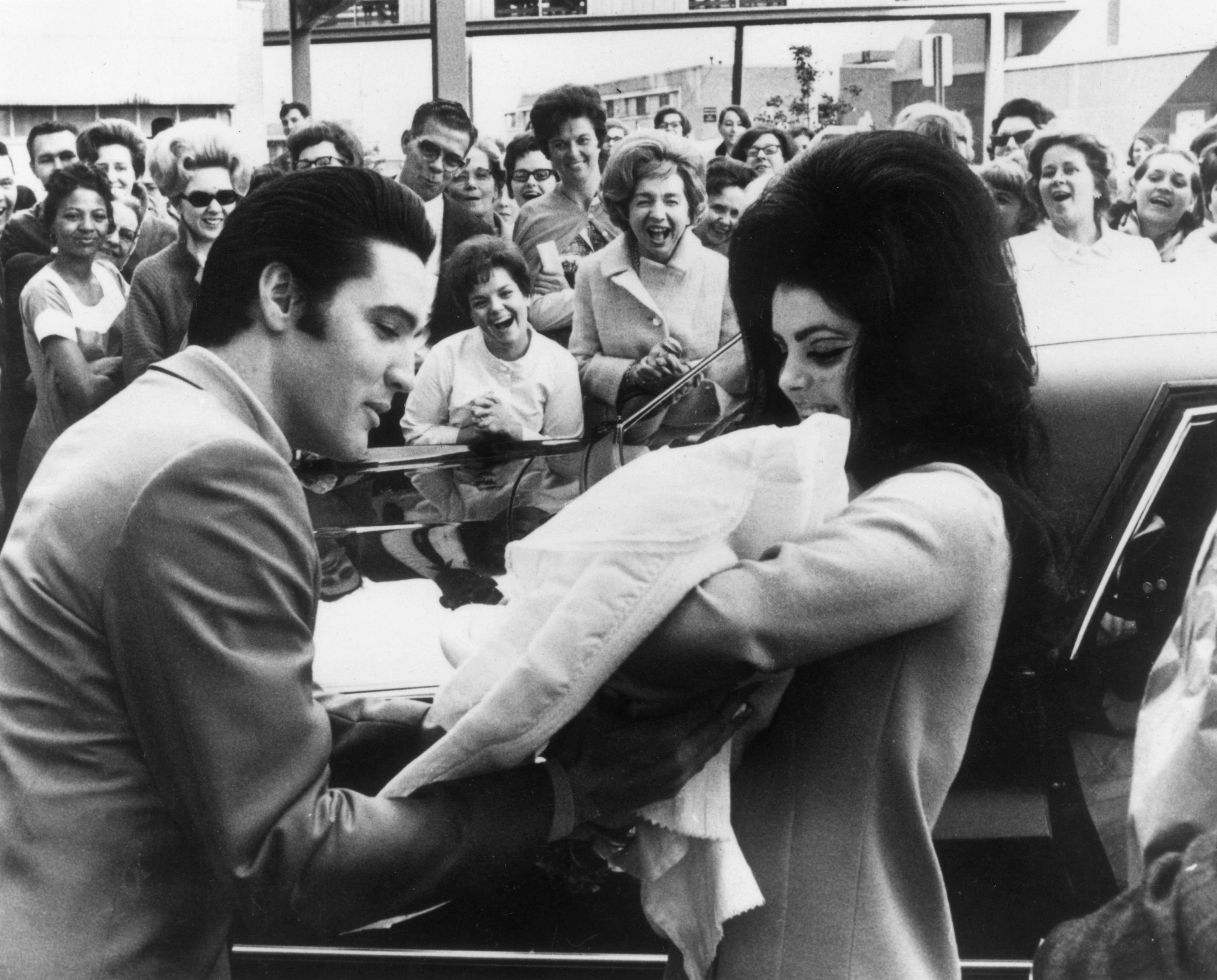 13th February 1968:  Elvis and Priscilla Presley with their daughter, Lisa Marie, born on 2nd February.  (Photo by Keystone/Getty Images)