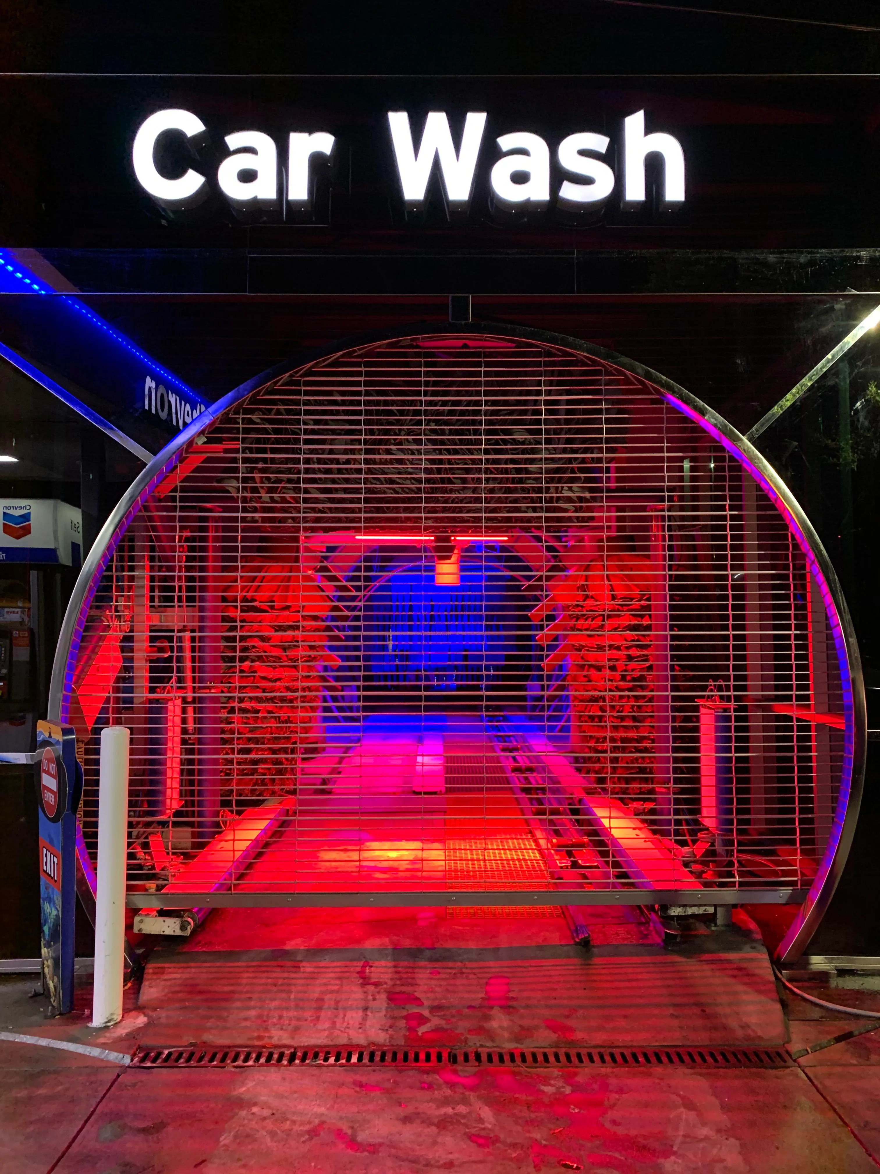 This car wash looks like the entrance to the hottest club in New York.