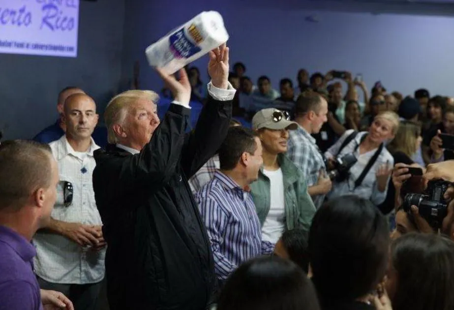 President Trump throwing paper towels to his fans in Puerto Rico