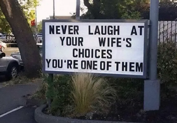sign that says you shouldnt laugh at your wifes choices because youre one of them