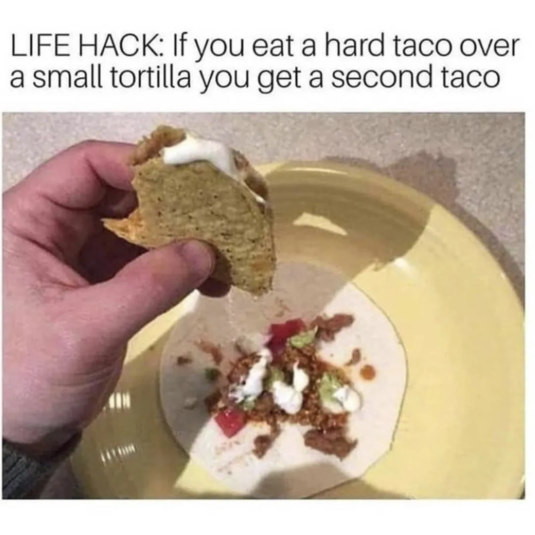 eating a tortilla over a taco to create a second taco