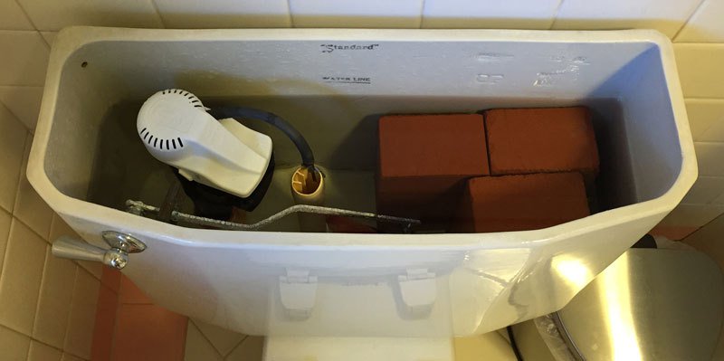 brick in toilet put a brick in toilet to reduce water usage