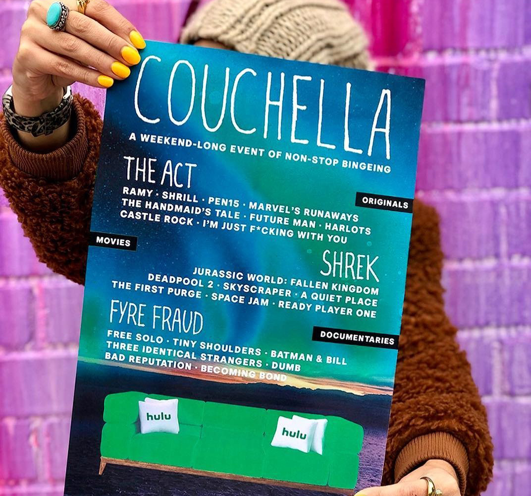 an ad for hulu an ad for hulu of a woman holding up a couchella sign