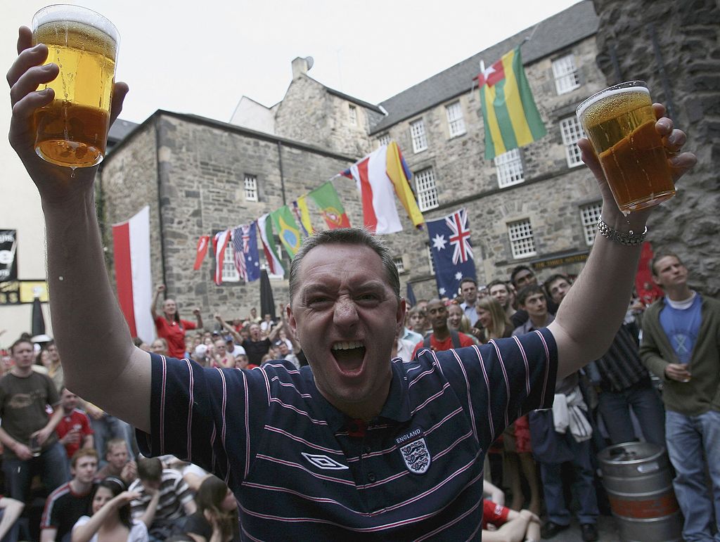 Trinidad and Tobago and England soccer fans react during a big screen viewing of the England v Trinidad and Tobago Trinidad and Tobago and England soccer fans react during a big screen viewing of the England v Trinidad and Tobago