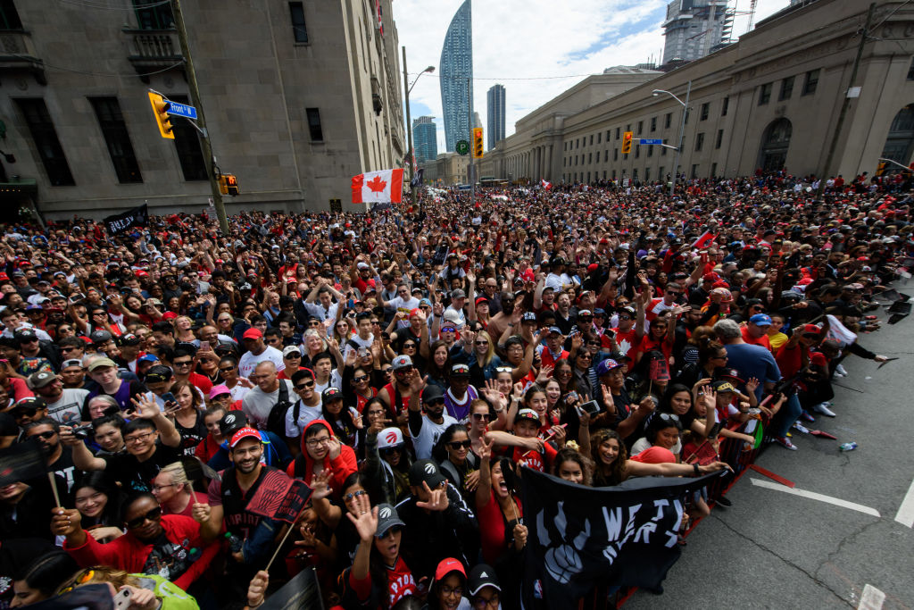 Fans cheer as they wait for the Toronto Raptors Championship parade-1150381198 Fans cheer as they wait for the Toronto Raptors Championship parade-1150381198