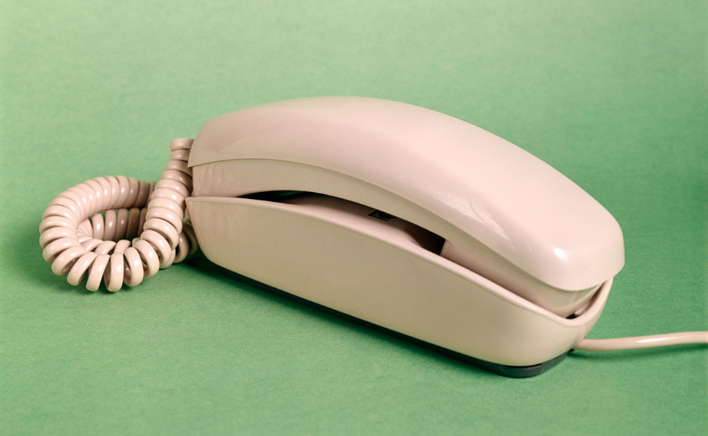 1960s BEIGE TRIMLINE SPRING CORDED TELEPHONE-563958443 1960s BEIGE TRIMLINE SPRING CORDED TELEPHONE-563958443