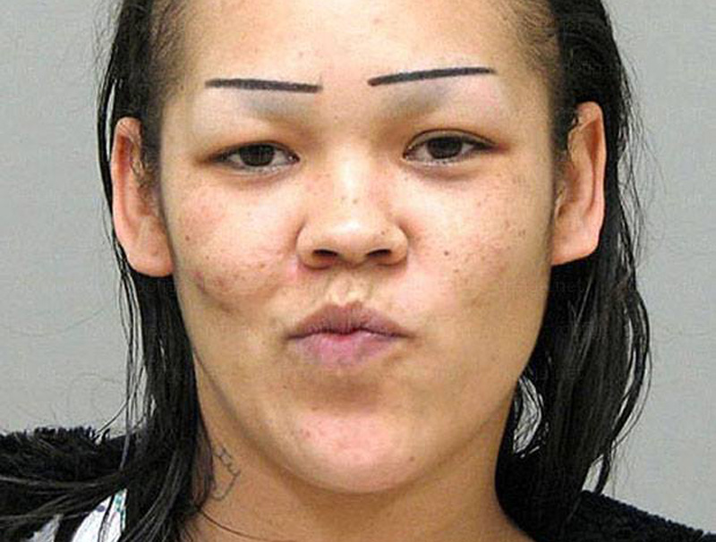bad eyebrows 25 a mugshot of a woman with straight eyebrows