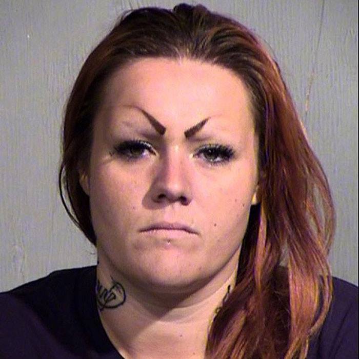 bad eyebrows 23 a mugshot of a woman with mean eyebrows