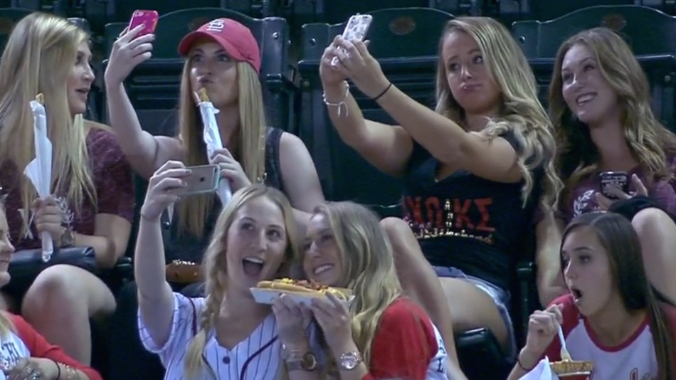 girls taking selfies baseball game sorority girls taking selfies at baseball game