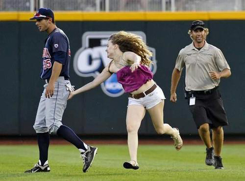 fan runs on field to touch players a female fan ran onto the field to grab players' butts