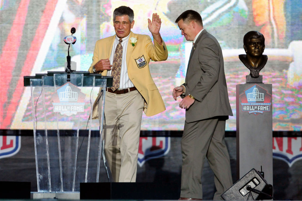 Chris Hanburger-120511470 CANTON, OH - AUGUST 6: Former Washington Redskins linebacker Chris Hanburger waves to the fans after the unveiling of his bust at the Enshrinement Ceremony for the Pro Football Hall of Fame on August 6, 2011 in Canton, Ohio.
