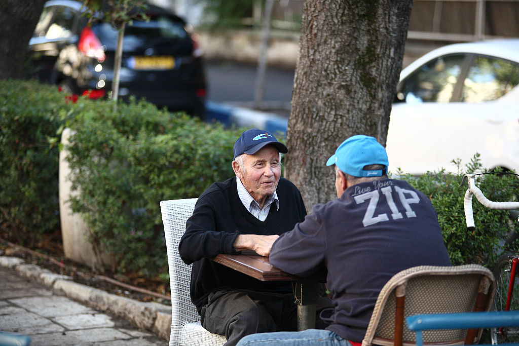 two men chatting-544479177 if the creek don't rise