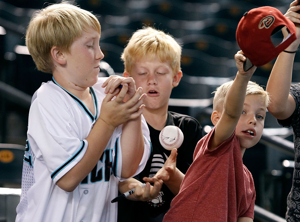 How Many Boys Does It Take Boys trying to catch a ball