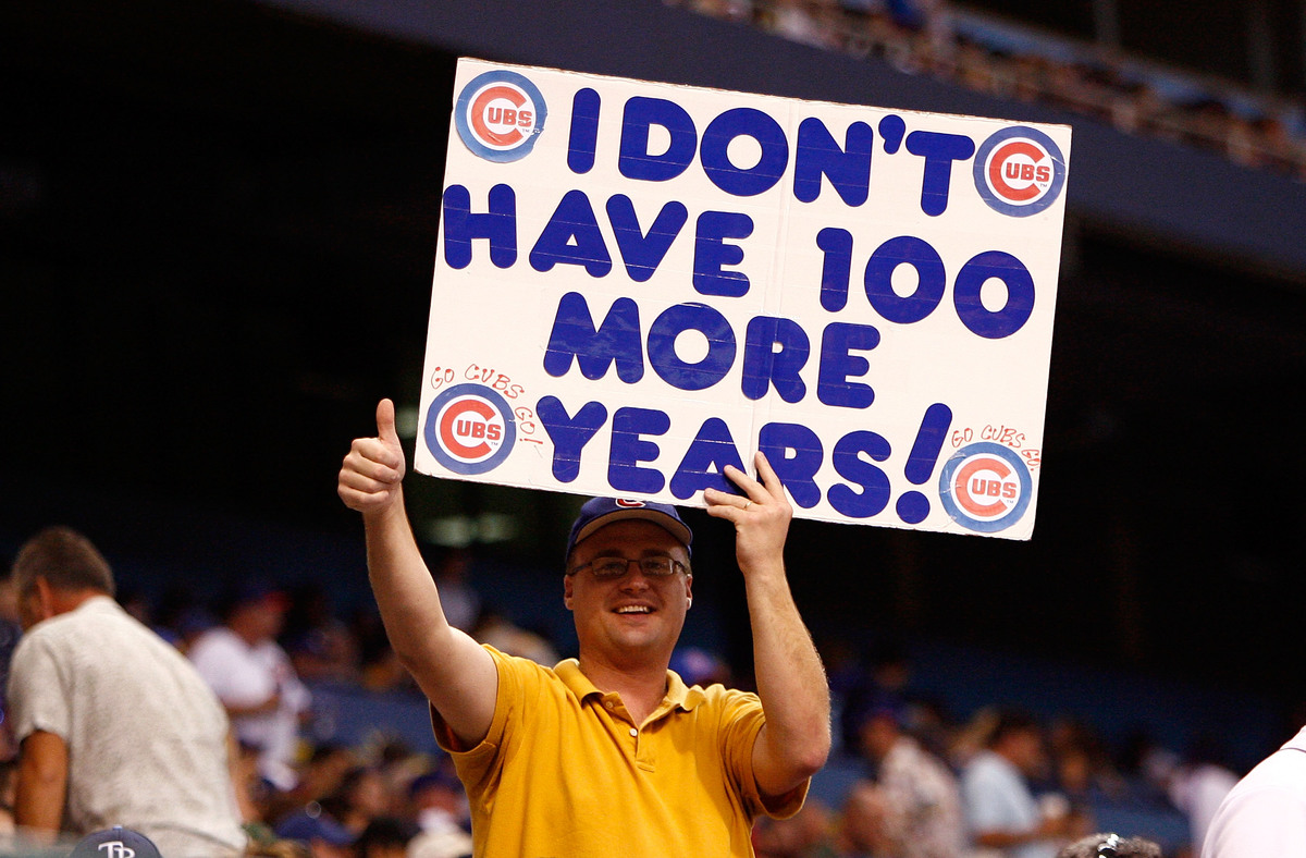 cubs fan-81626876 A fan of the Chicago Cubs holds a sign during the game against the Tampa Bay Rays during the game at Tropicana Field June 18, 2008 in St. Petersburg, Florida.