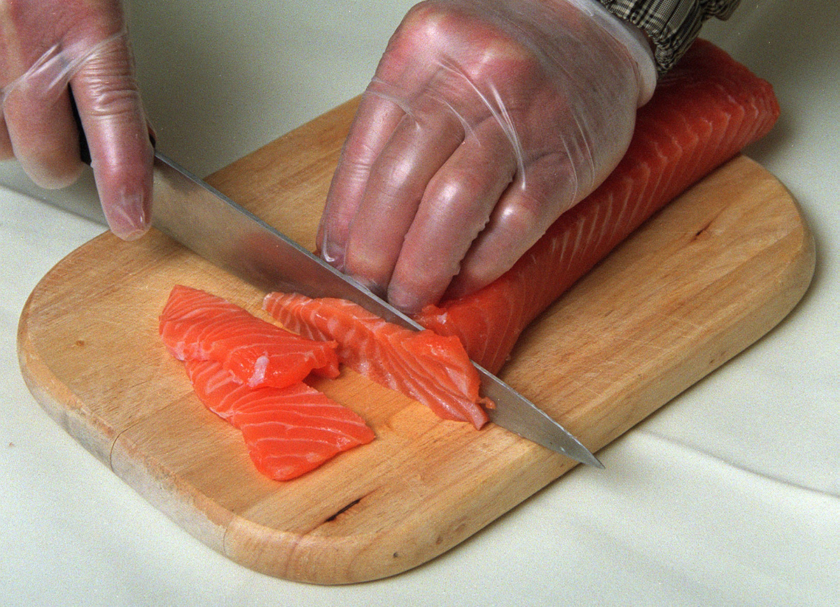 cutting salmon - 1126668092 Chef So Kwai-fung demonstrates how to cook his fresh salmon.