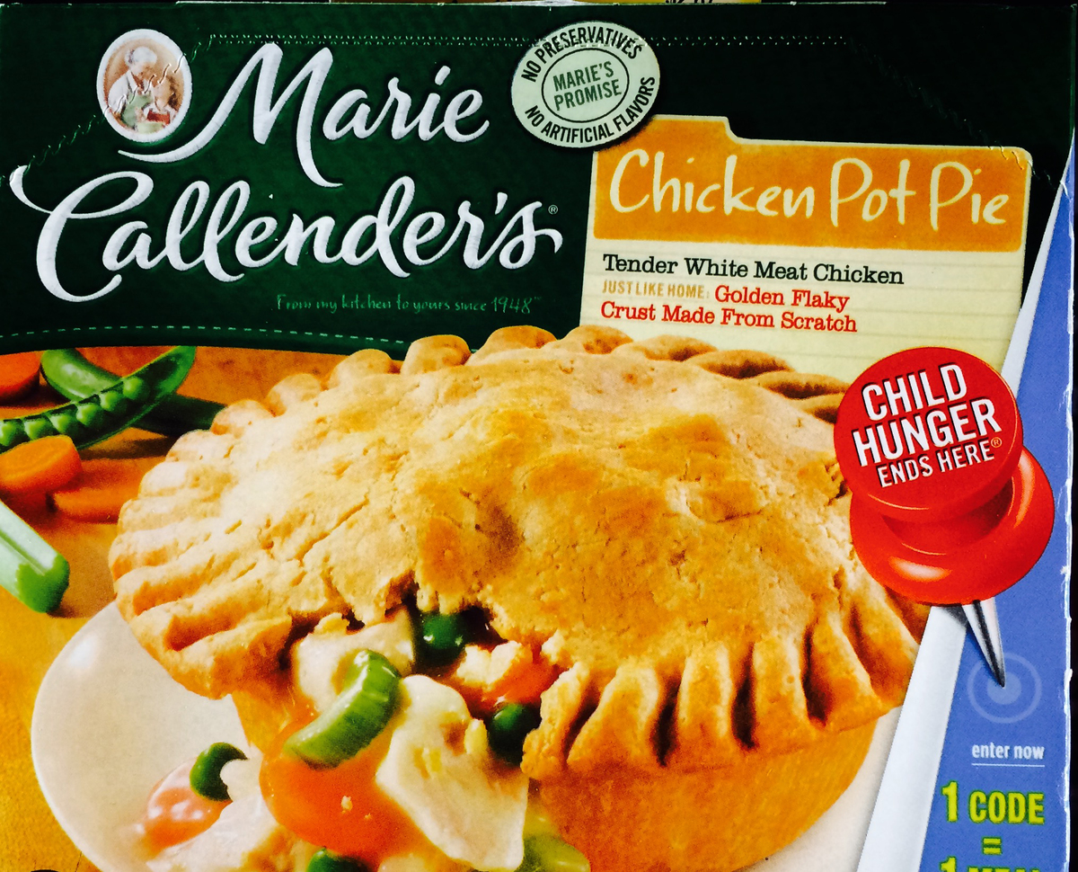 frozen pot pie - 548777947 The frozen meal box is for a Marie Callender's chicken pot pie.