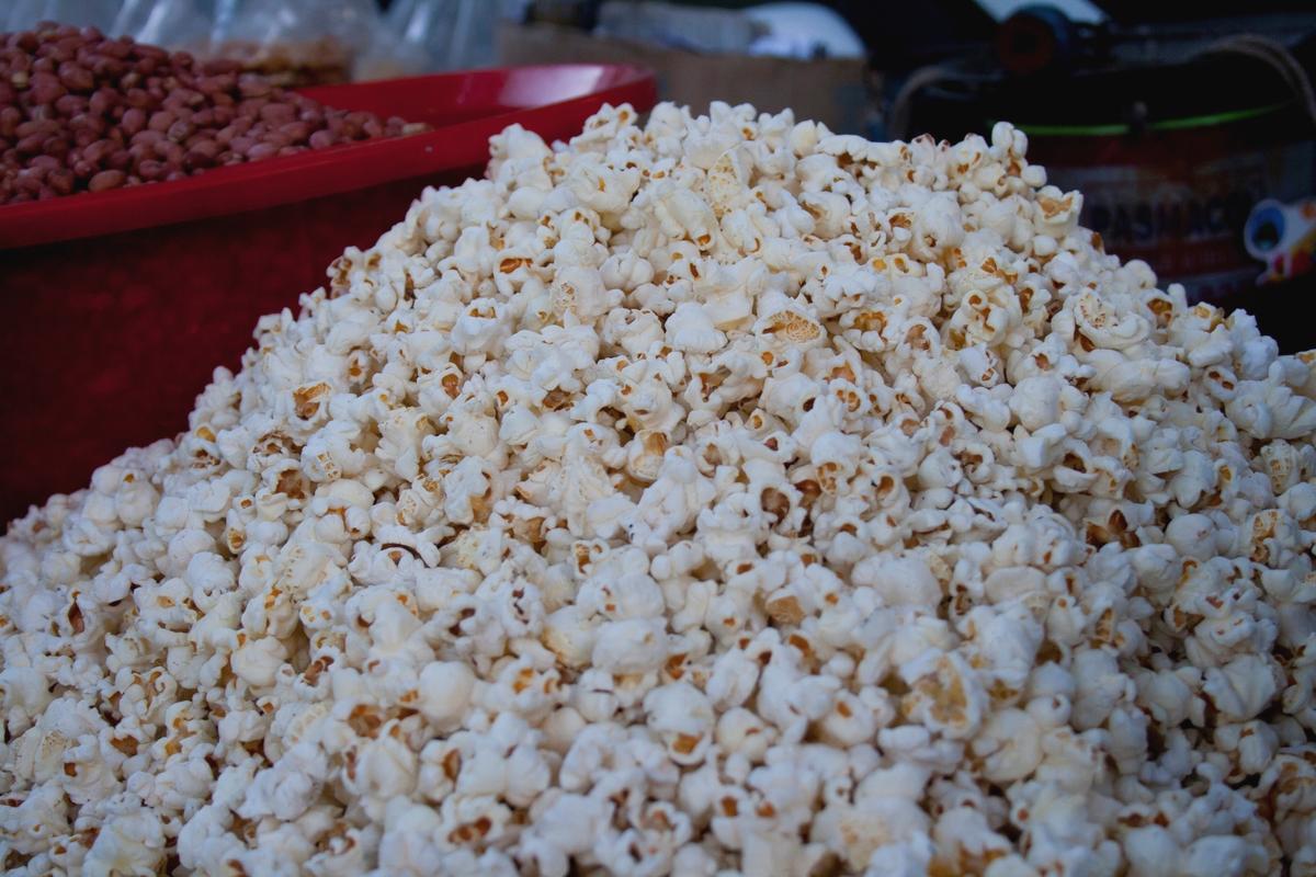 pile of popcorn-636150396 Popcorn is sold in a big pile.