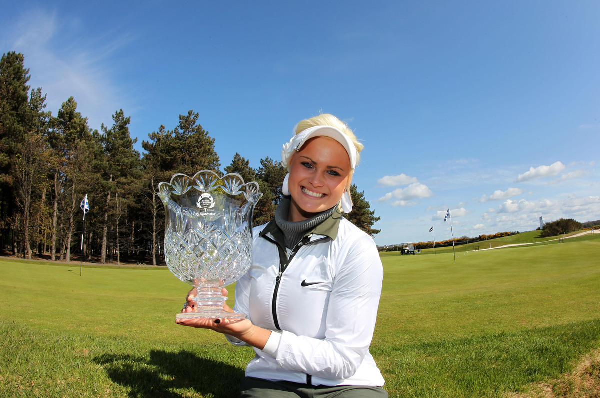 Archerfield - 847952052 Scotland's Carly Booth celebrates winning the Asset Management Ladies Scottish Open at Archerfield Links Golf Course.