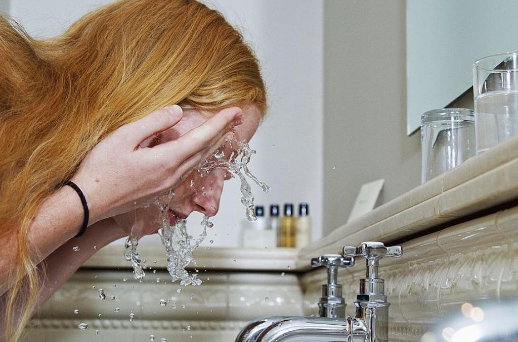face Woman washing her face