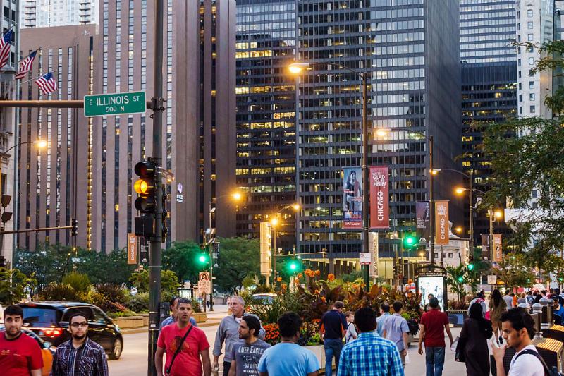 magnificent mile 614266774 people walking along the magnificent mile during sun down