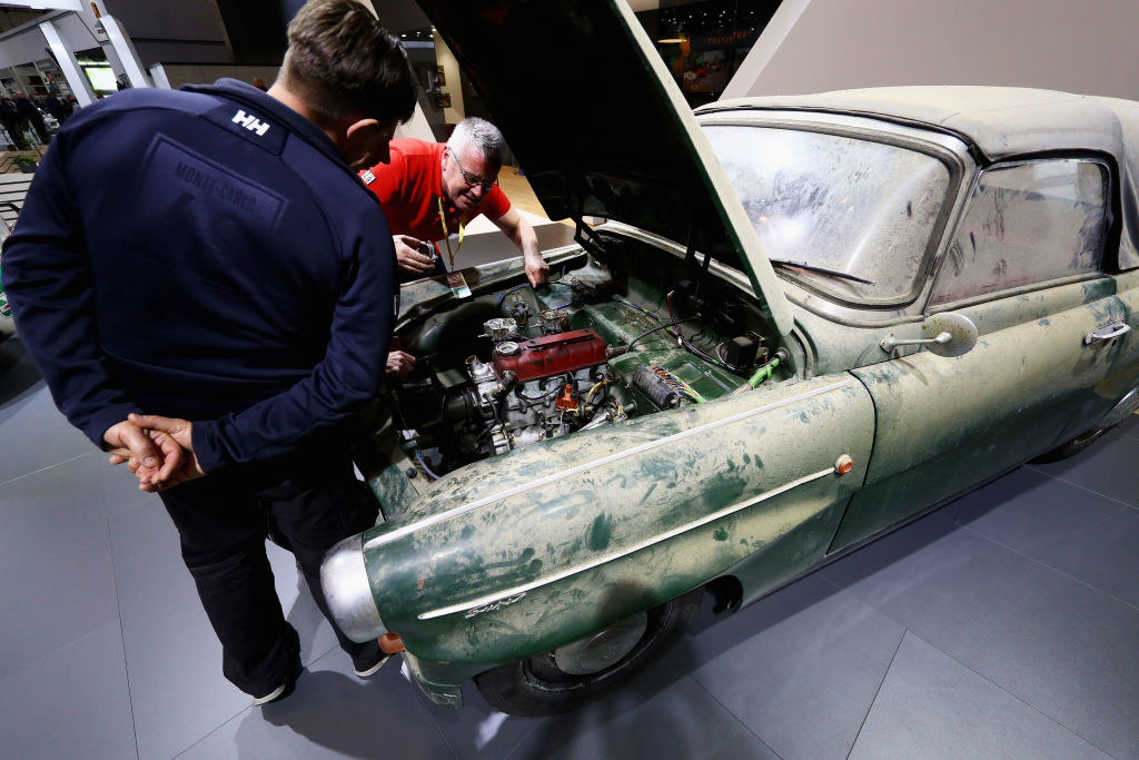 working on car Mechanics work on a Barn Find Skoda