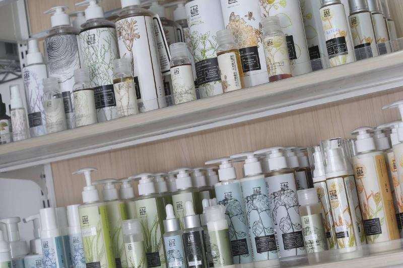skincare products - 1092738640 Organic skincare products line the shelves of a supermarket.