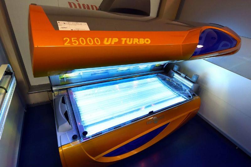 tanning bed-485224380 An indoor tanning bed is open.