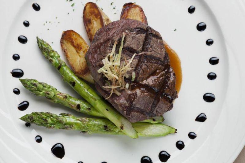 Overhead shot of filet mignon with asparagus and potatoes Overhead shot of filet mignon with asparagus and potatoes