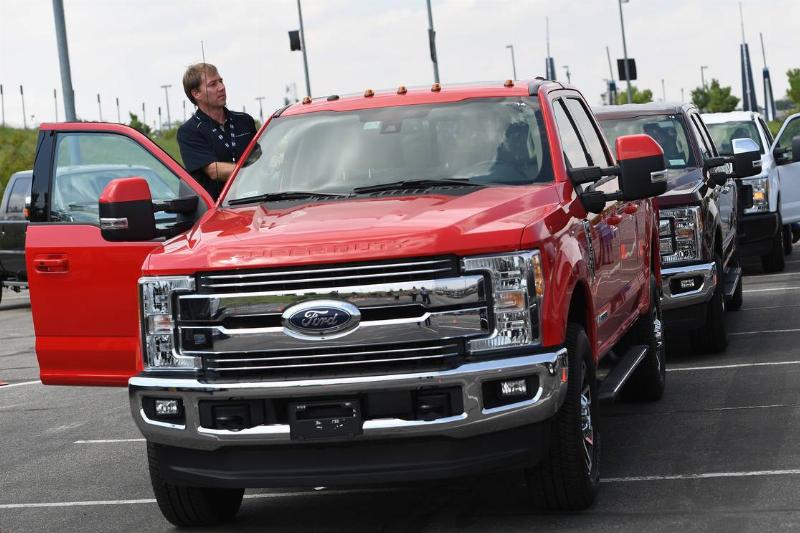 Ford truck presents it's newest Ford F-Series Super Duty trucks in the parking lot of Sports Authority Field at Migh High in Denver, Colorado Ford truck presents it's newest Ford F-Series Super Duty trucks in the parking lot of Sports Authority Field at Migh High in Denver, Colorado