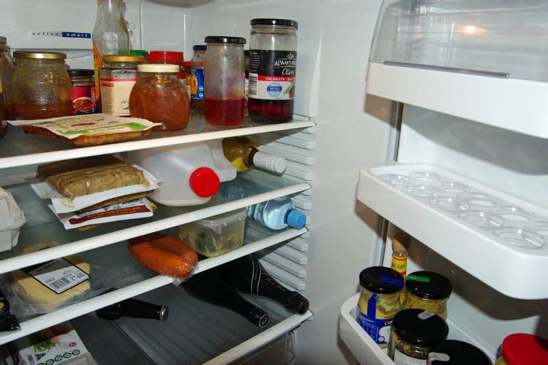 GettyImages-559441111 food in fridge open fridge with food in it