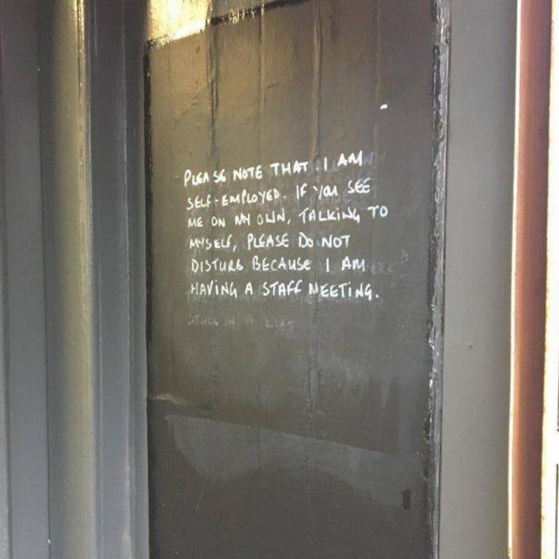 white writing on black wall 