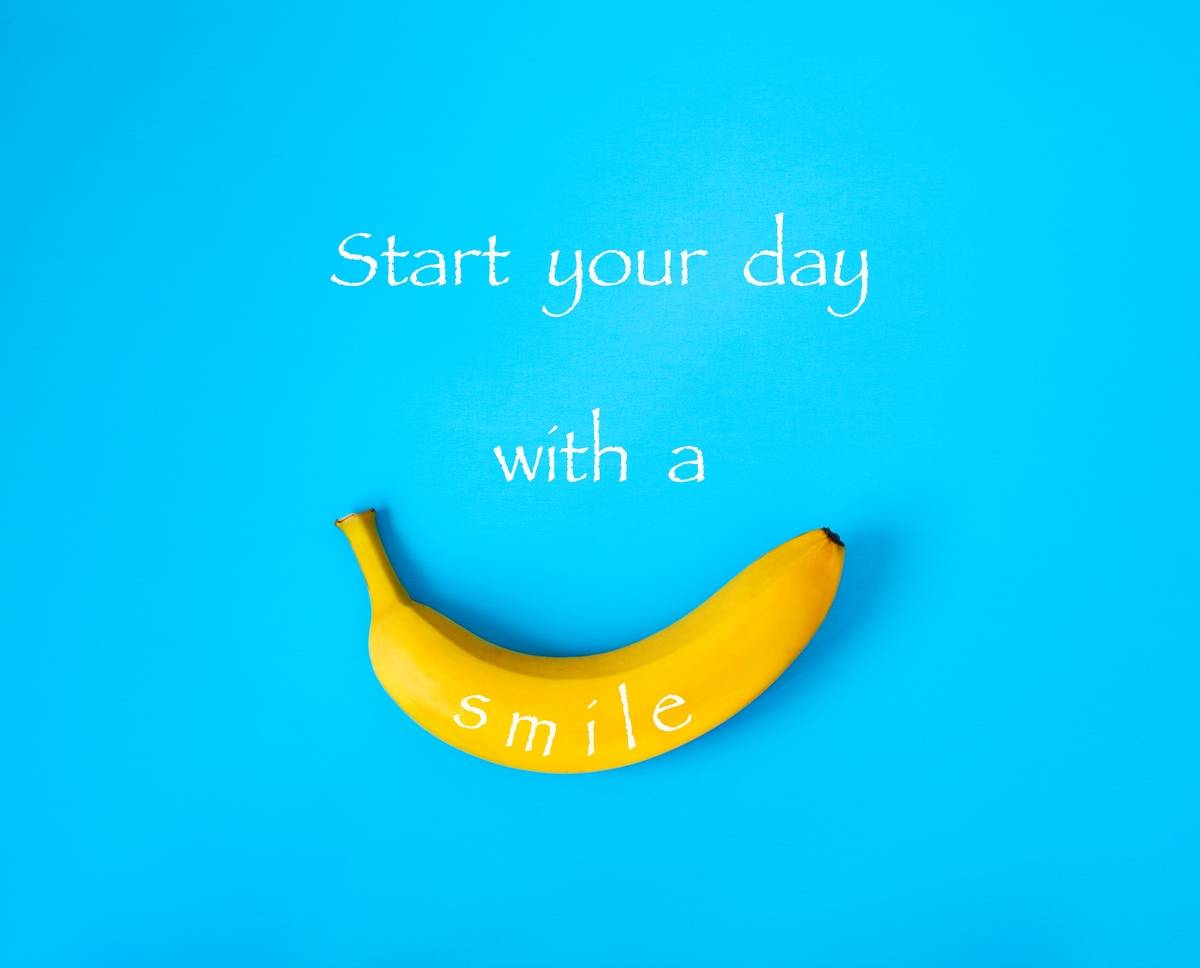 A banana is on a blue background with text that says, 