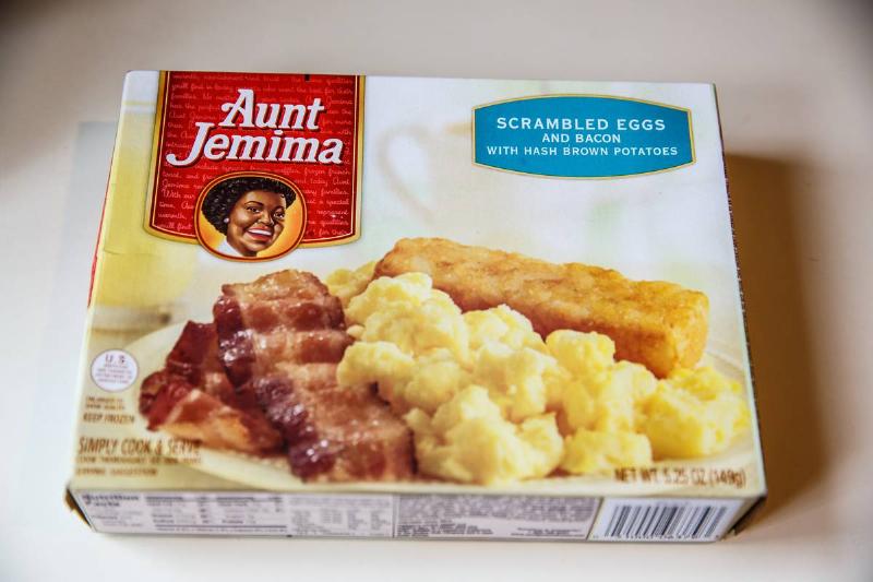 Food Packaged A packaged Aunt Jemima frozen breakfast of eggs and bacon lies on the table.