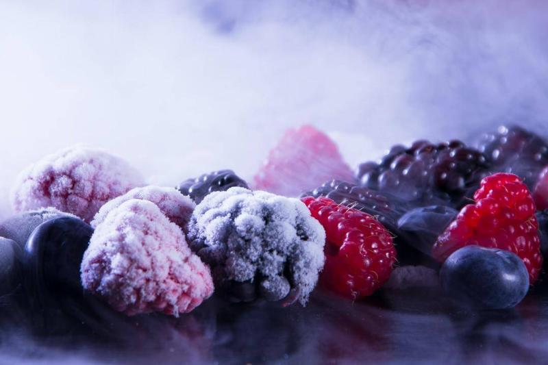 frozen berries Frozen berries sit next to fresh berries.