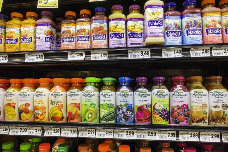 premade smoothies Shelves of packaged smoothies are seen at a supermarket.
