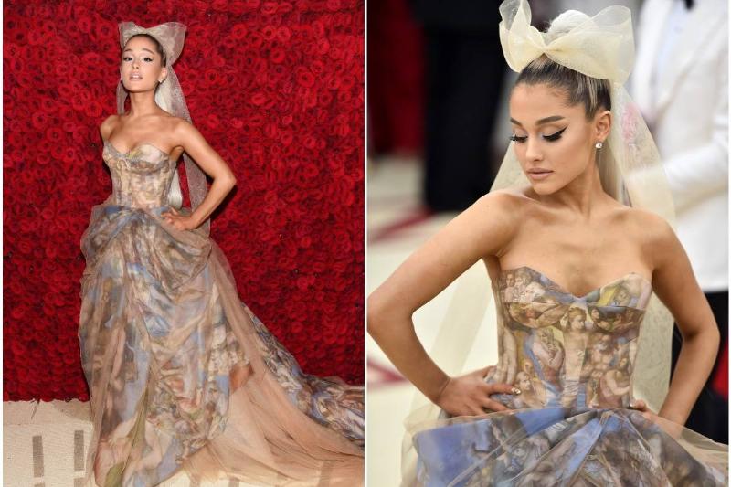Ariana Grande Ariana Grande poses to show off her Met Gala dress, 2018.
