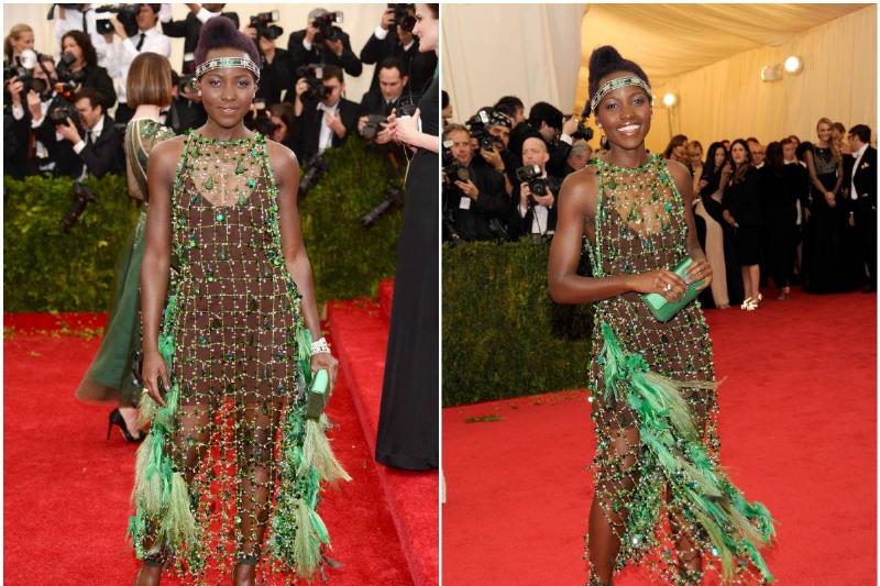 Lupita Nyong'o Lupita Nyong'o poses for photos while at the 2014 Met Gala.