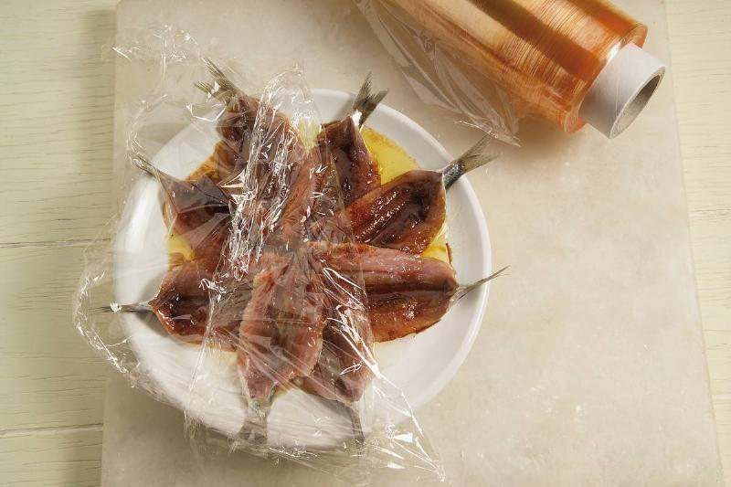 Anchovies in a dish marinating in balsamic vinegar... Anchovies in a dish marinating in balsamic vinegar...