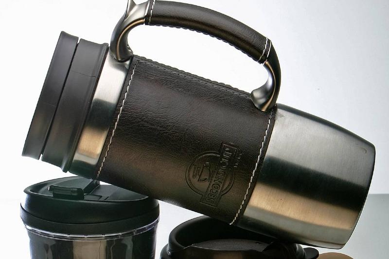 travel mugs A travel mug is stacked on top of two others.