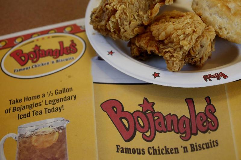 Bojangle's Fried chicken is placed on a Bojangle's placemat.