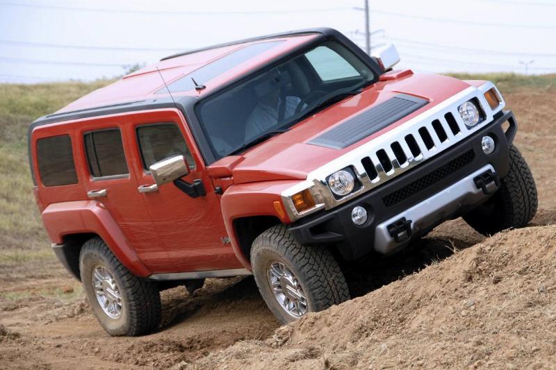 A 2008 Hummer H3 is driven off-road during the General Motor A 2008 Hummer H3 is driven off-road during the General Motor
