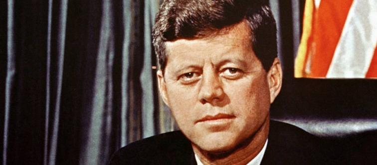 The 35th U.S. president sits in the Oval Office in the White House, 1961.
