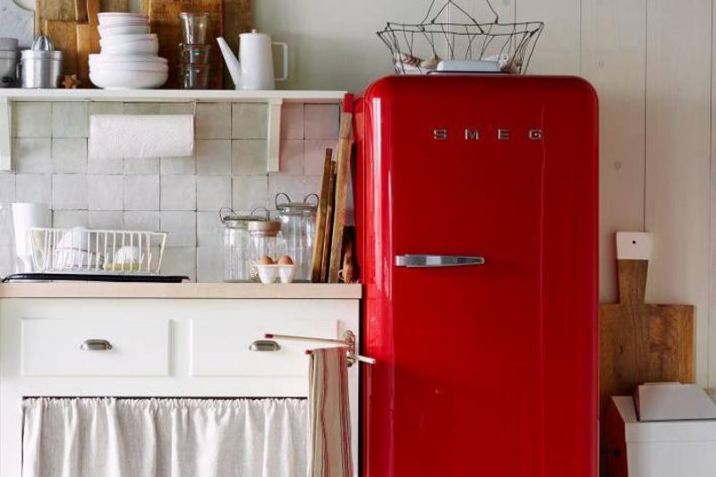 a-bright-red-refrigerator-in-a-white-kitchen-cropped-copy-66342