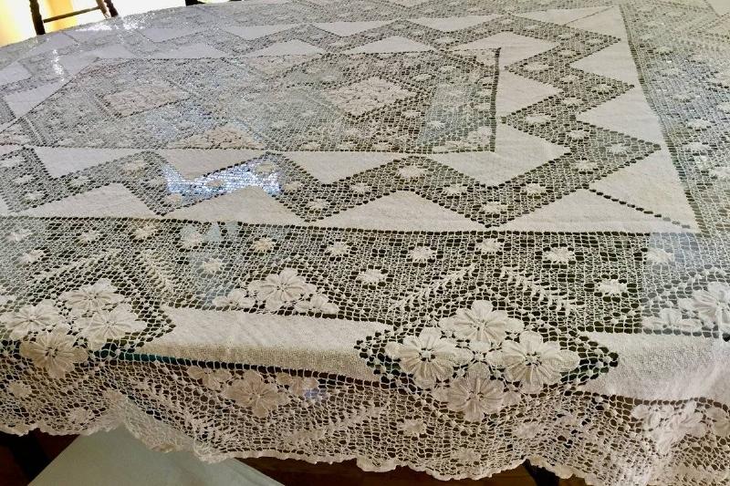 ivory-lace-tablecloth-on-a-black-table-28783