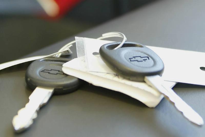 Keys lay on the seat of a car in the showroom of Byers Chevr Keys lay on the seat of a car in the showroom of Byers Chevr
