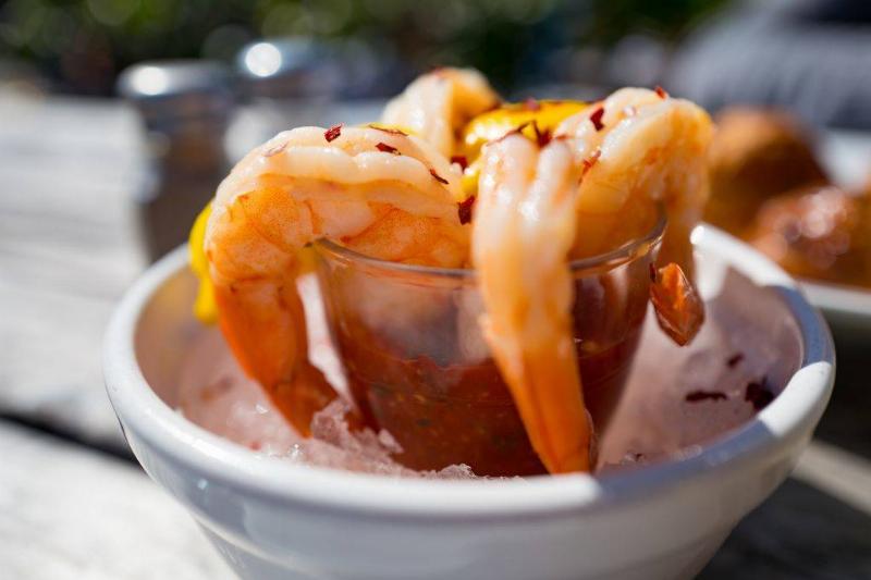 appetizer 653248374 Shrimp cocktail served with lemon and cocktail sauce