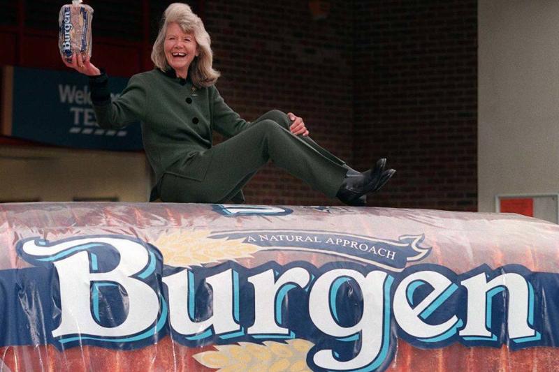 burgen 829967568 woman holding loaf of burgen bread