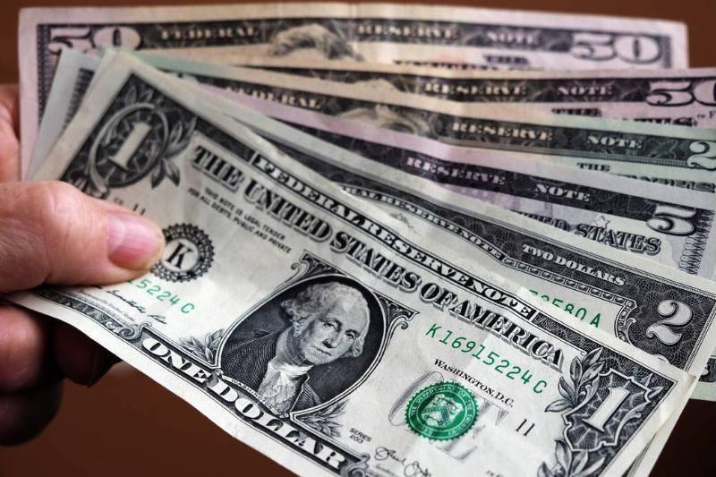 in-this-photo-illustration-a-1-dollar-bill-with-various.-65250 in-this-photo-illustration-a-1-dollar-bill-with-various.-65250