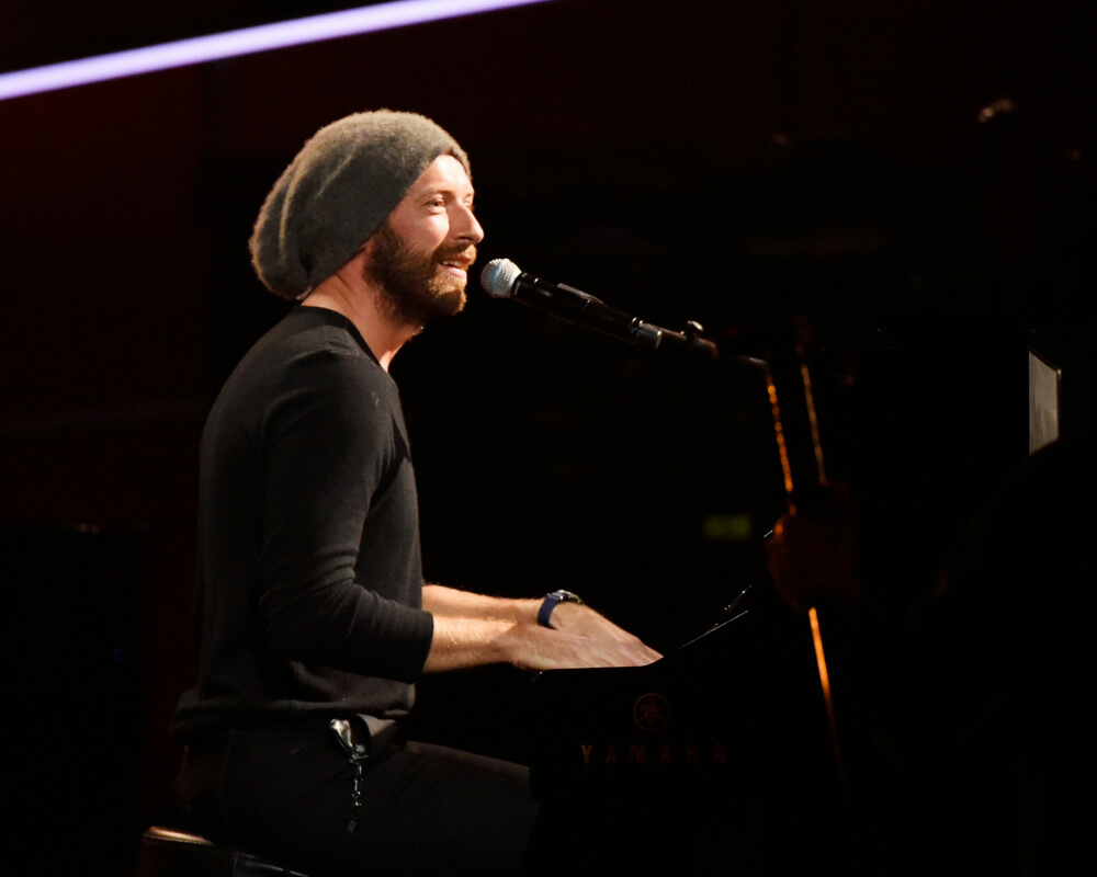 Coldplay frontman Chris Martin performs on stage